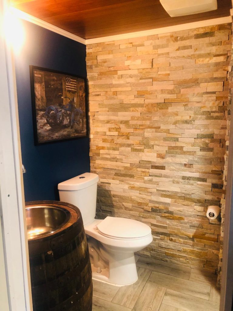 diy home decor blue bathroom with stone wall